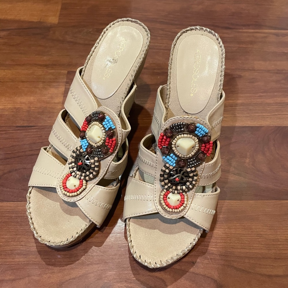 Size 9 wedge slip on sandals.